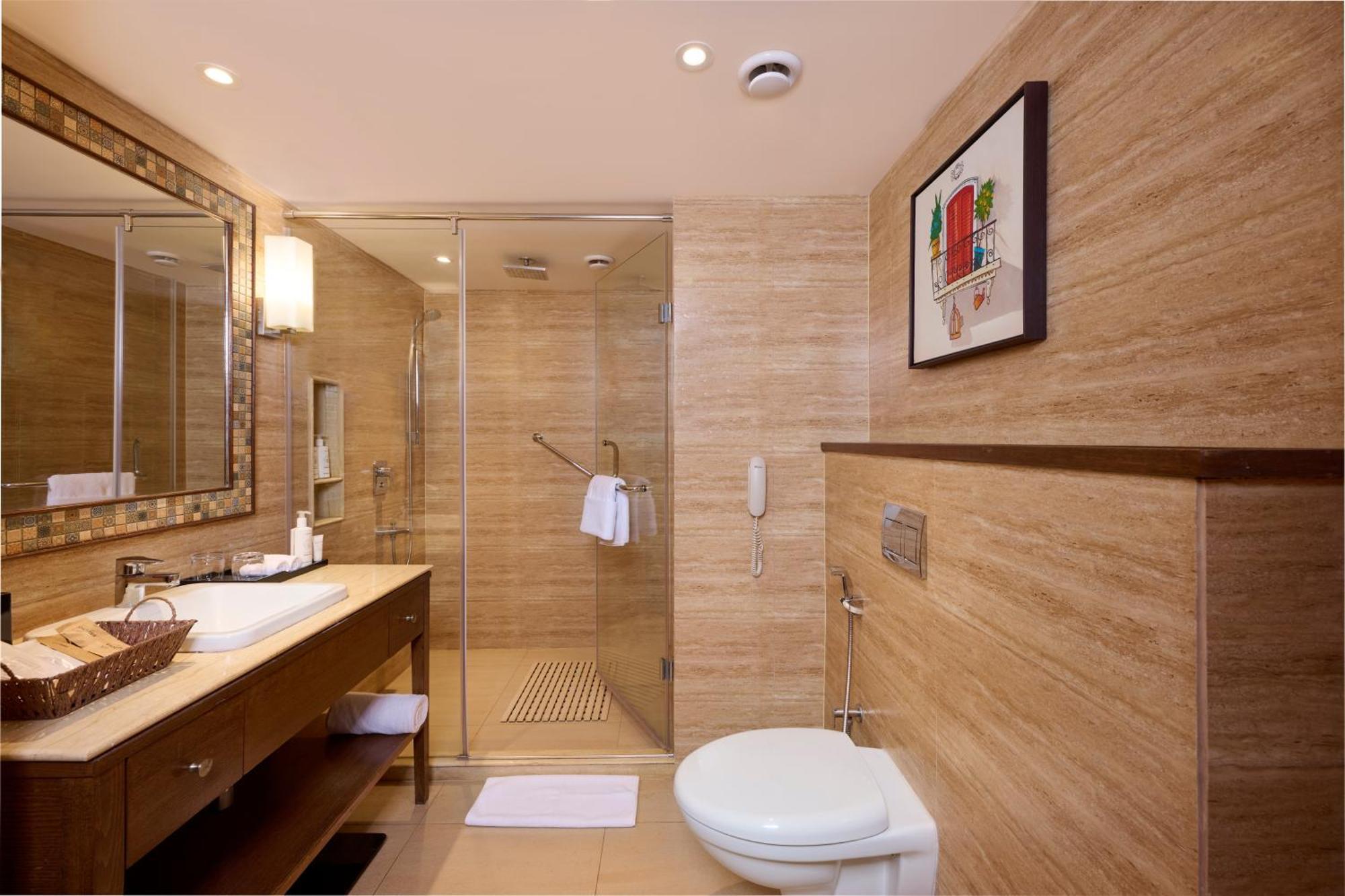 Golden Tulip Vagator Goa Hotell Exteriör bild
